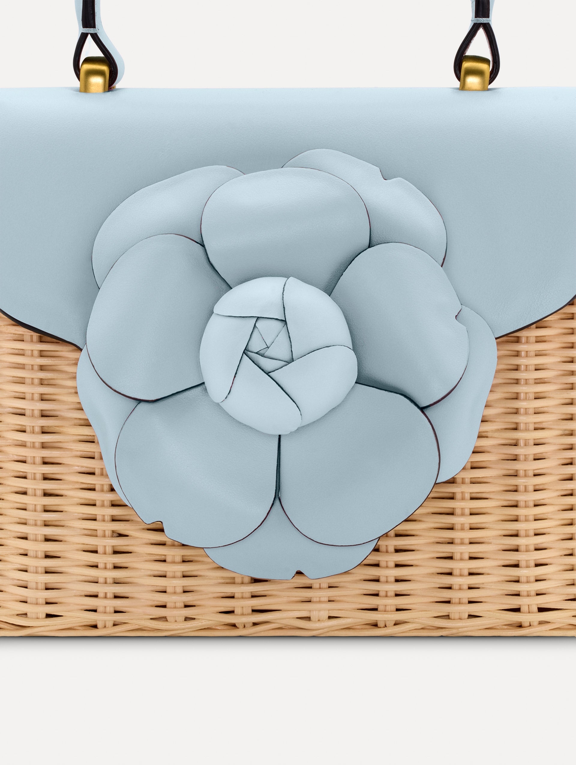 Blue Wicker Mini TRO Bag with a flower clasp and blue leather flap. Zoom View.
