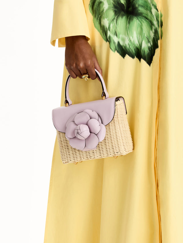 lilac Wicker Mini TRO Bag with floral motif clasp and leather flap. Zoom View.