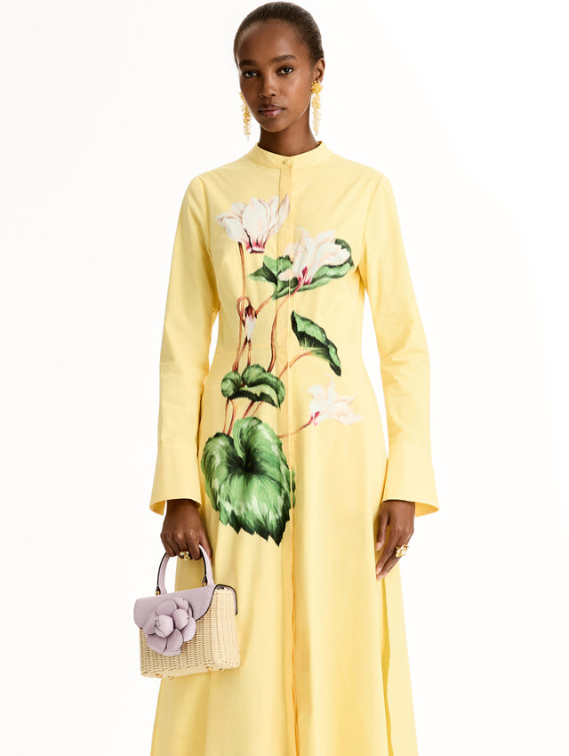 lilac Wicker Mini TRO Bag with floral motif clasp and leather flap. Front View.