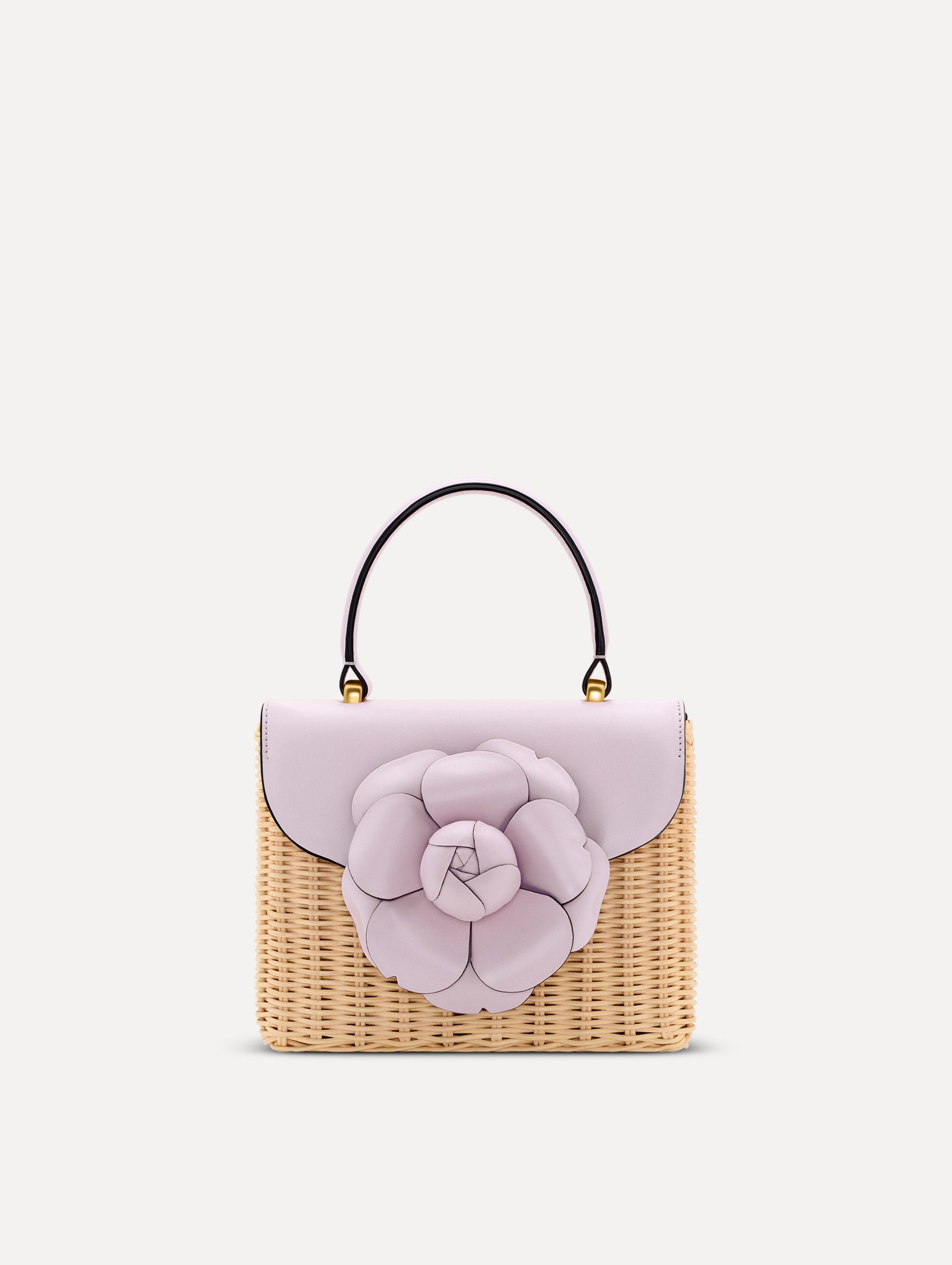 lilac Wicker Mini TRO Bag with floral motif clasp and leather flap. Front View.