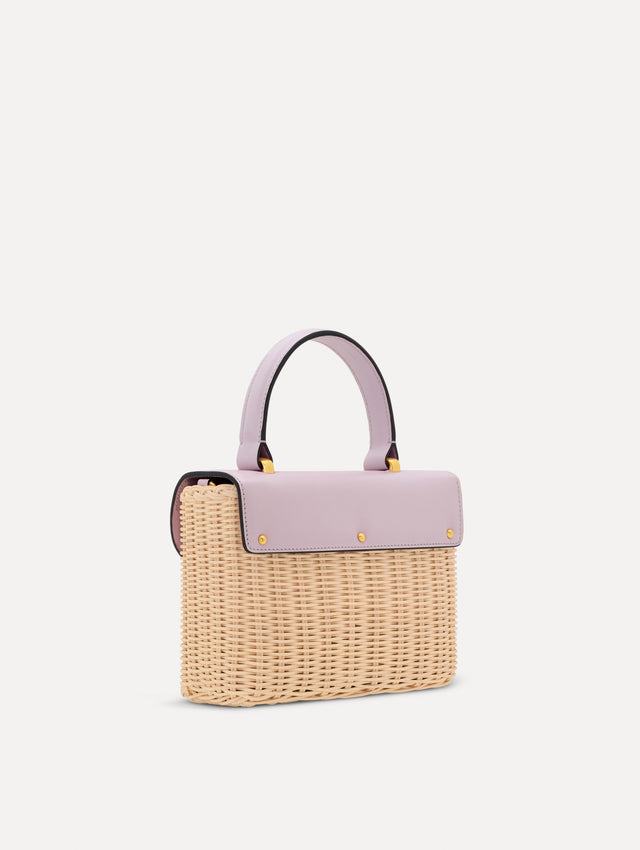 lilac Wicker Mini TRO Bag with floral motif clasp and leather flap. Side View.