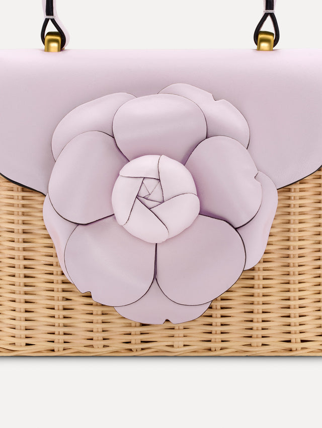 lilac Wicker Mini TRO Bag with floral motif clasp and leather flap. Zoom View.