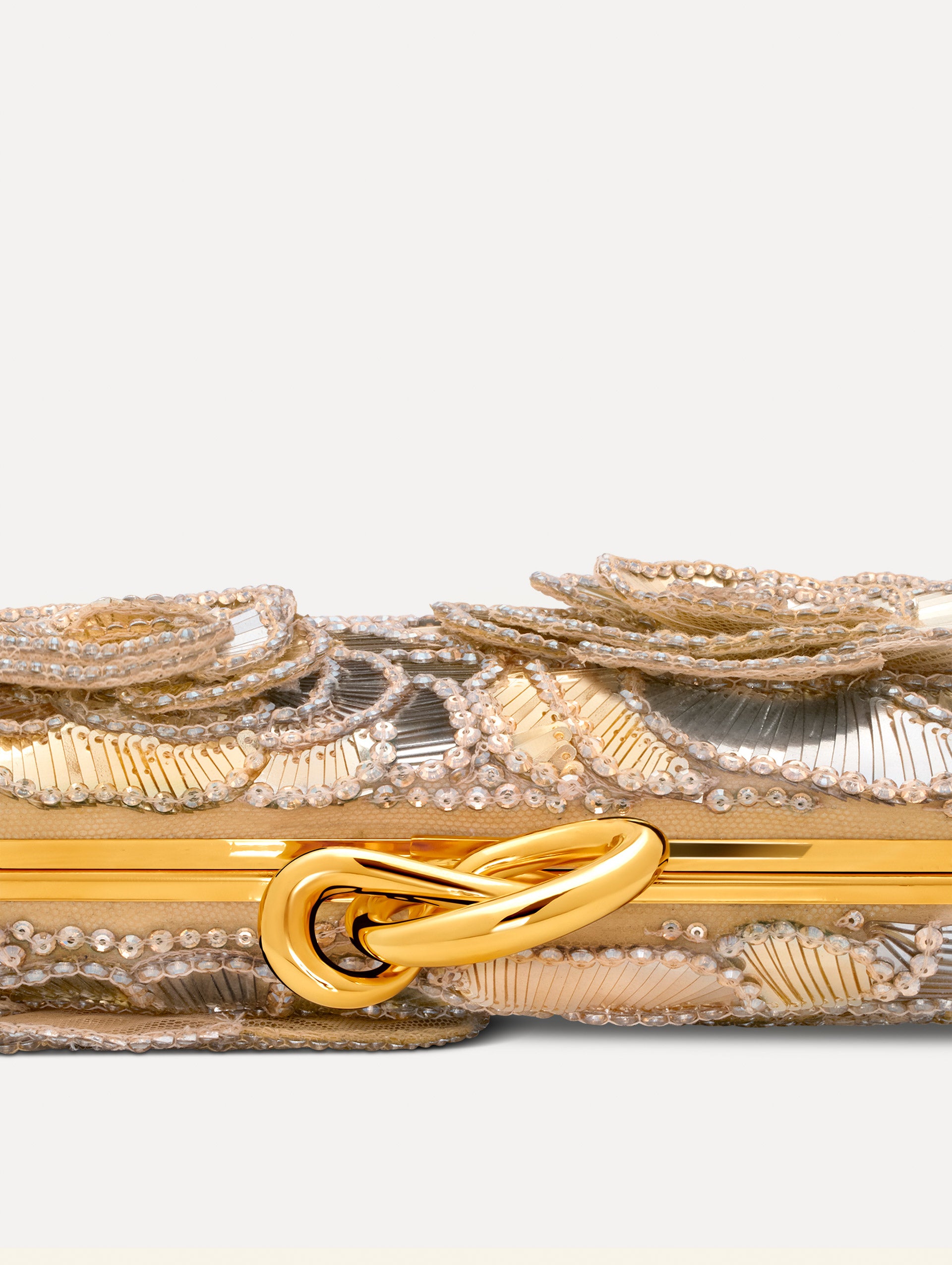 Silver Crystal Pavé Knot Minaudière with gold hardware and an O motif clasp.  Zoom View.
