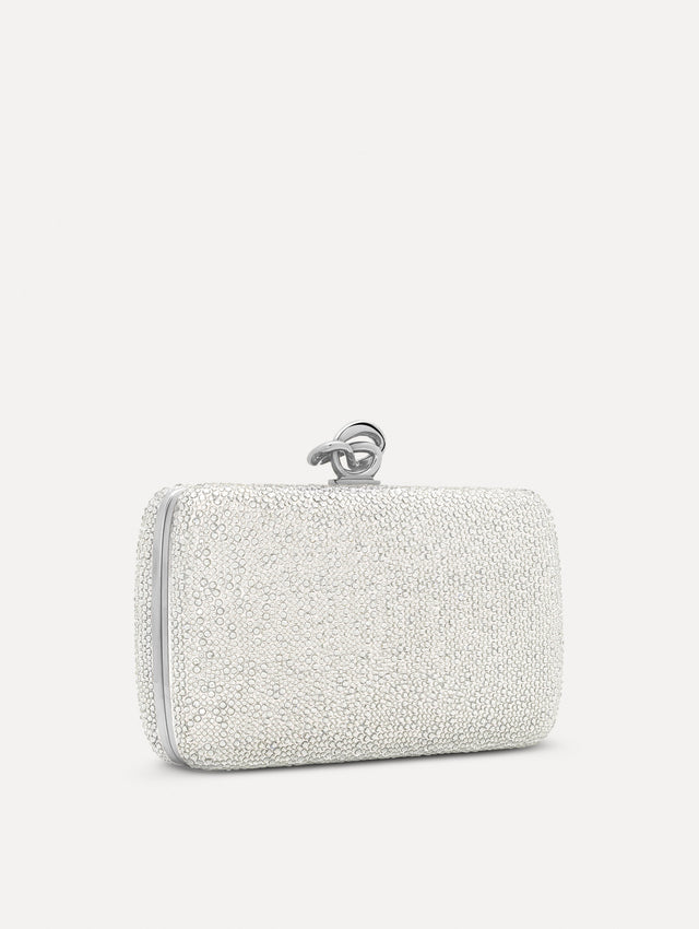 Silver Crystal Pavé Knot Minaudière with gold hardware and an O motif clasp.  Side View.