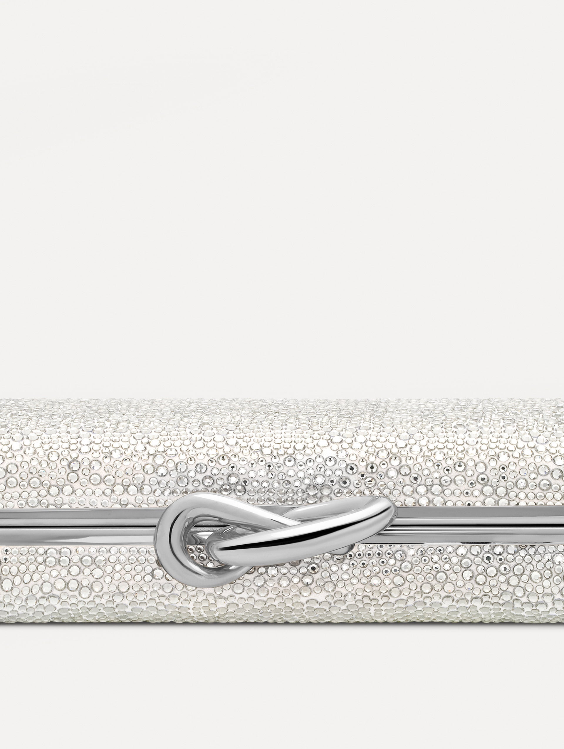 Silver Crystal Pavé Knot Minaudière with gold hardware and an O motif clasp.  Zoom View.