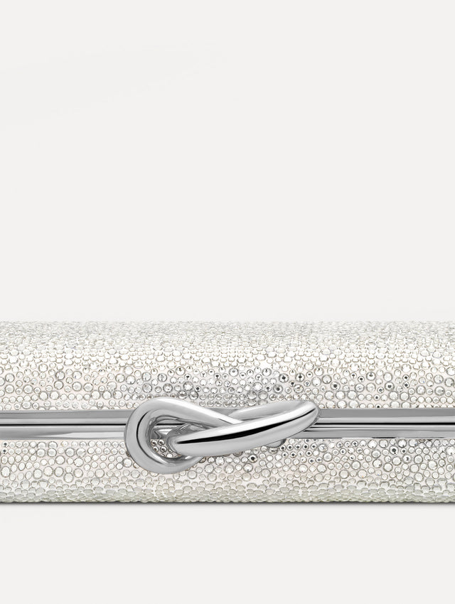 Silver Crystal Pavé Knot Minaudière with gold hardware and an O motif clasp.  Zoom View.