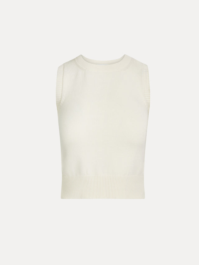 Sleeveless, halter neck, classic knit tank in soft ivory. Front View.
