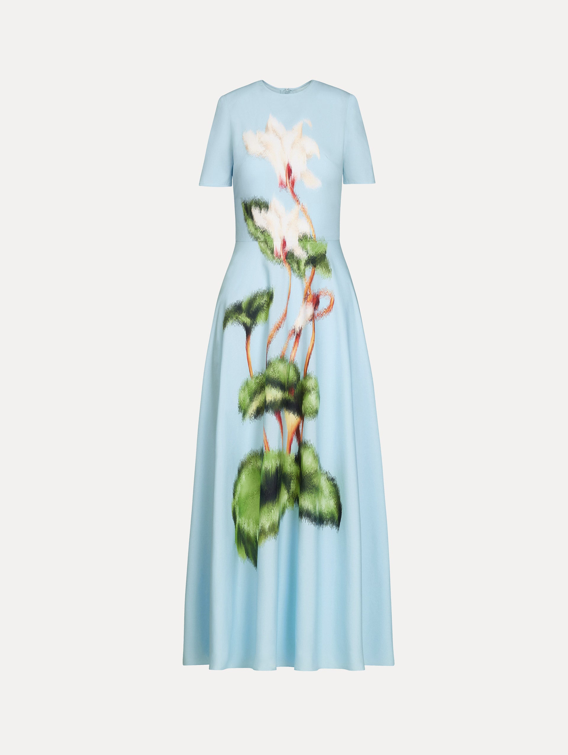 Short sleeve, light blue cotton poplin midi dress. Fitted bodice, full A-line skirt. Chiné Cyclamen motif with blurred, edges. Front View.