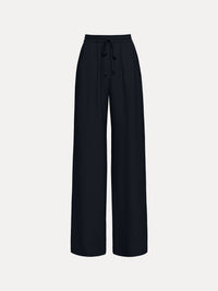 The Silk Georgette Drawstring Pant in the color navy blue featuring straight, wide-legs and an elastic waistband finished with a drawstring tie. Front View.