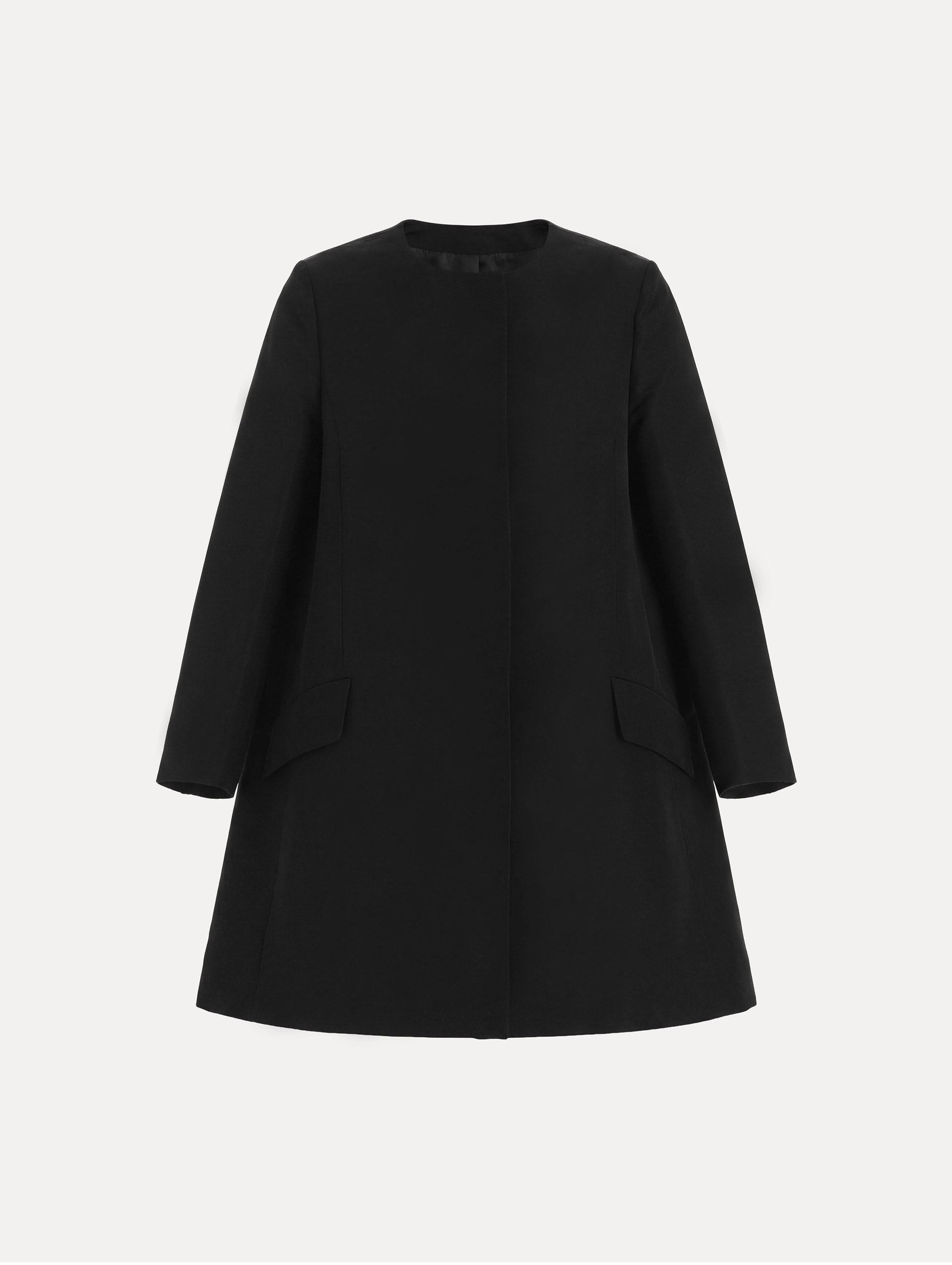 The Silk Faille Short Coat with flap pockets in the color black. 