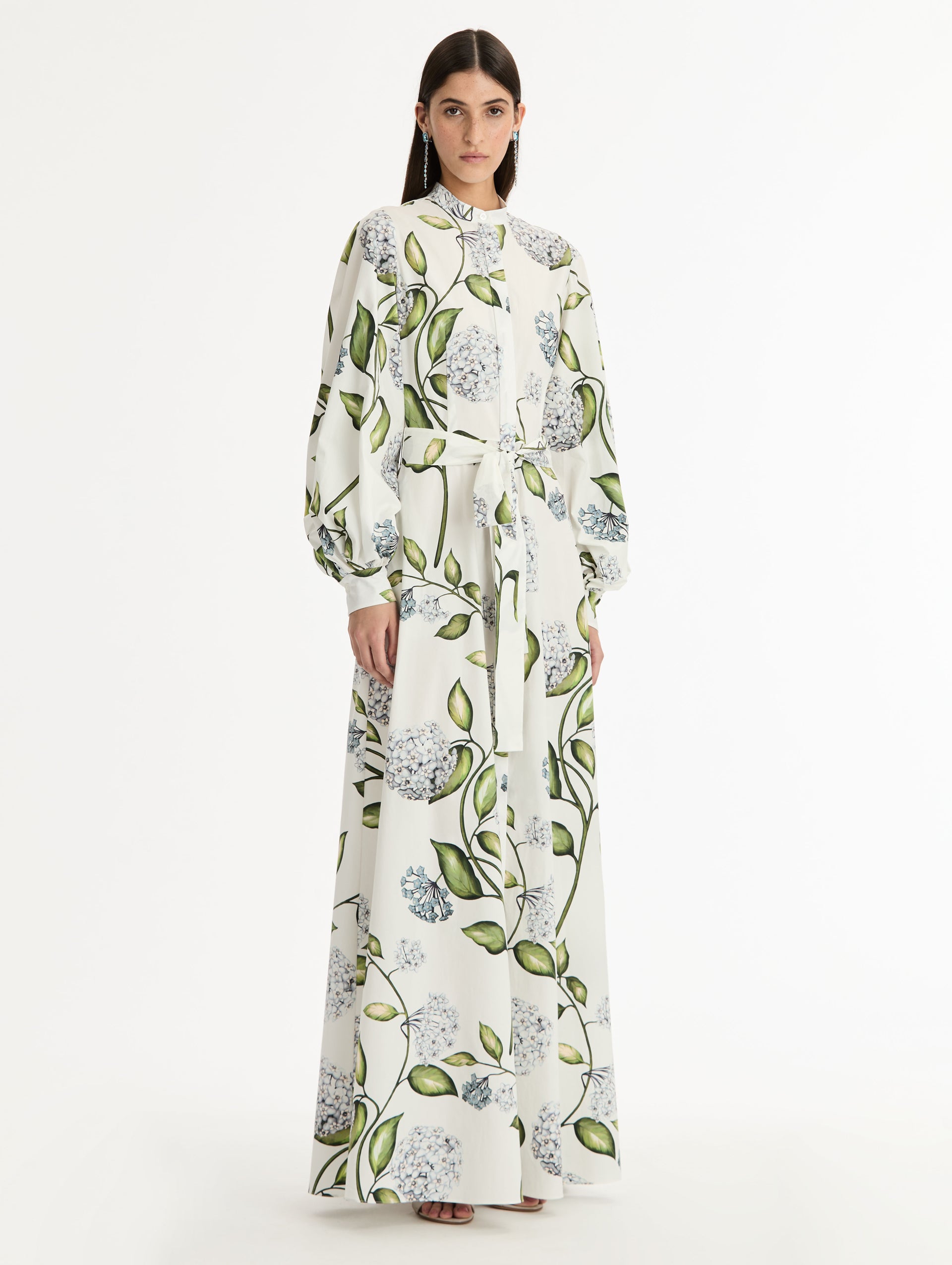 White Porcelain Flower Cotton Poplin Caftan with puffed sleeves and tie belted waist. Side View.