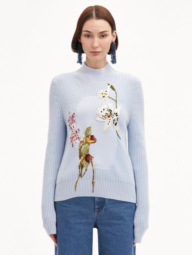 Light Blue Orchid Embroidered Portrait Pullover Styled with Jeans
Front View