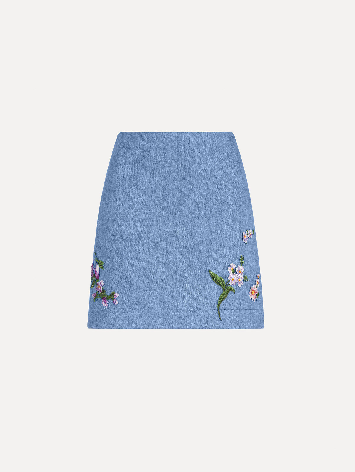 The image depicts an embroidered denim mini skirt. Front view.