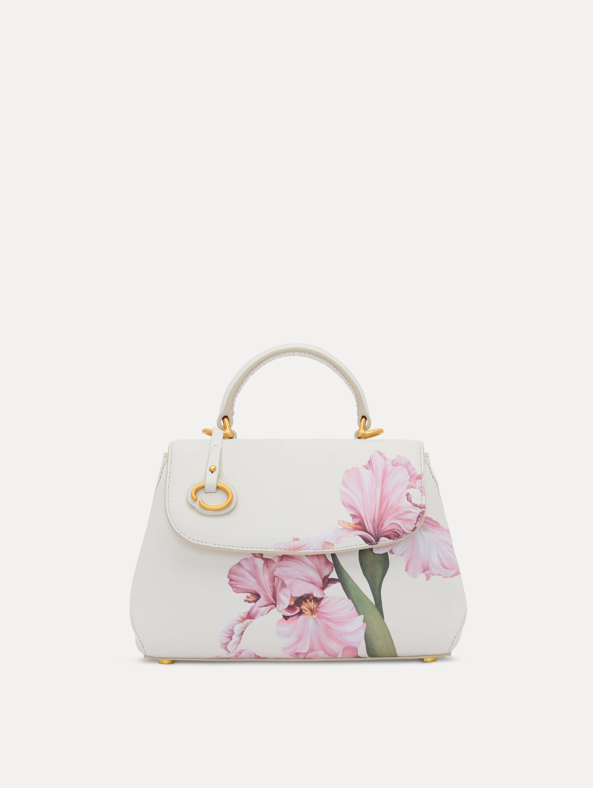 The model is carrying an iris printed mini poppy. Side view.