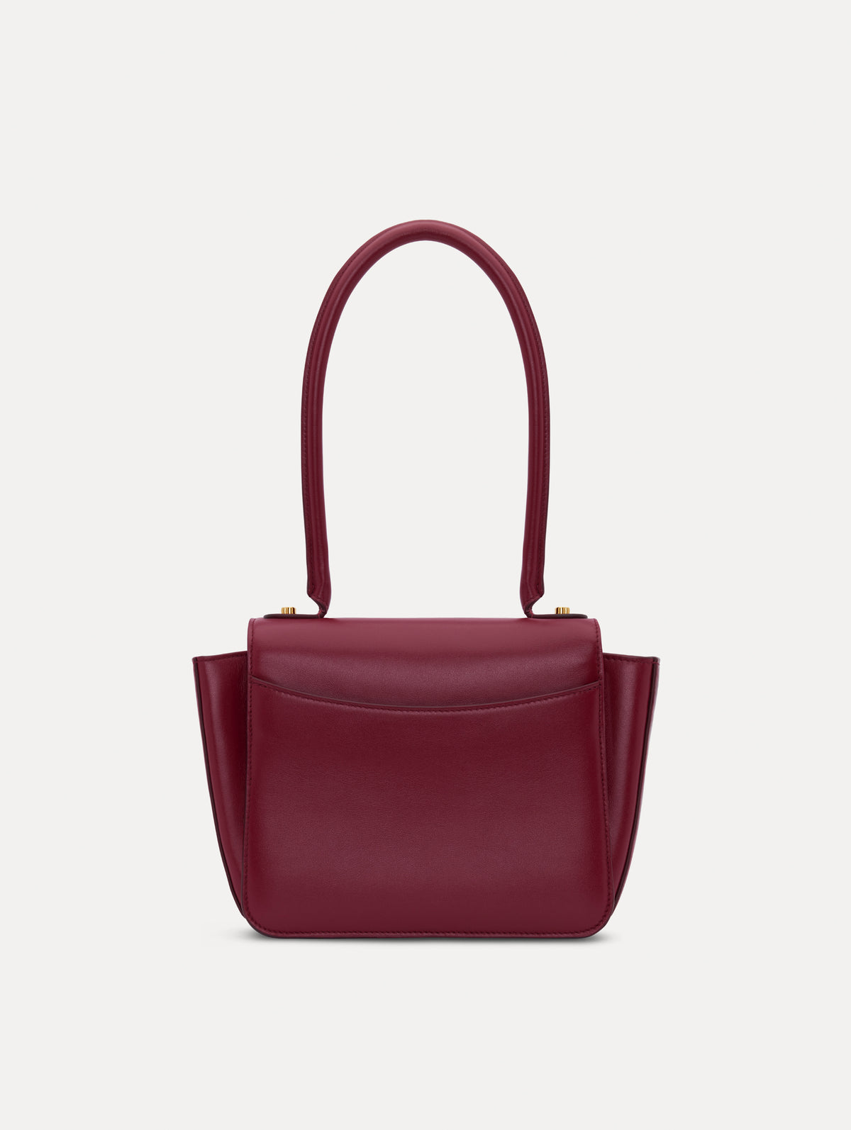 The model is carrying a top handle TRO bag. Back view.