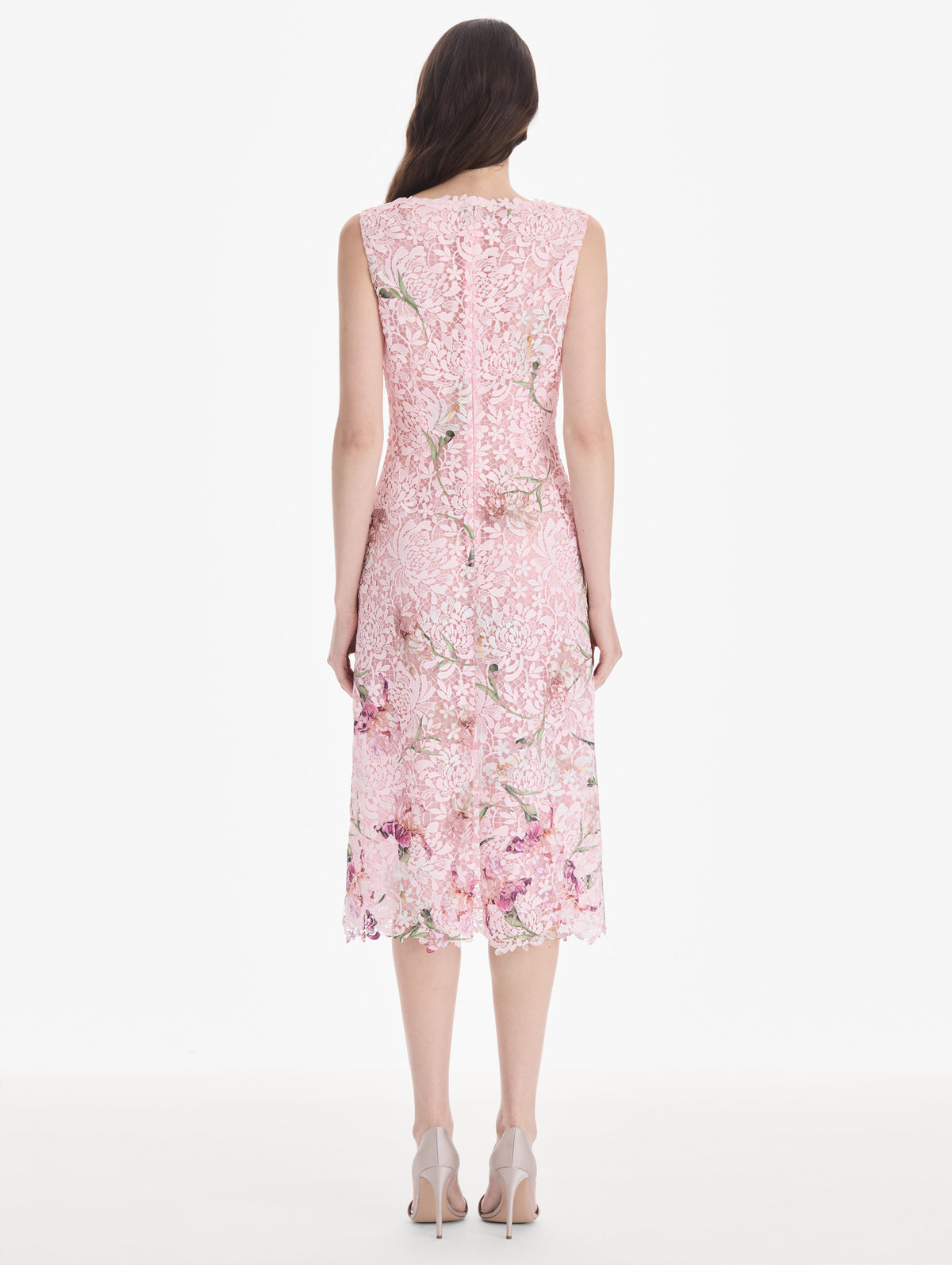 The model is wearing a cape sleeve painted iris degrade lace day dress. Zoom view.