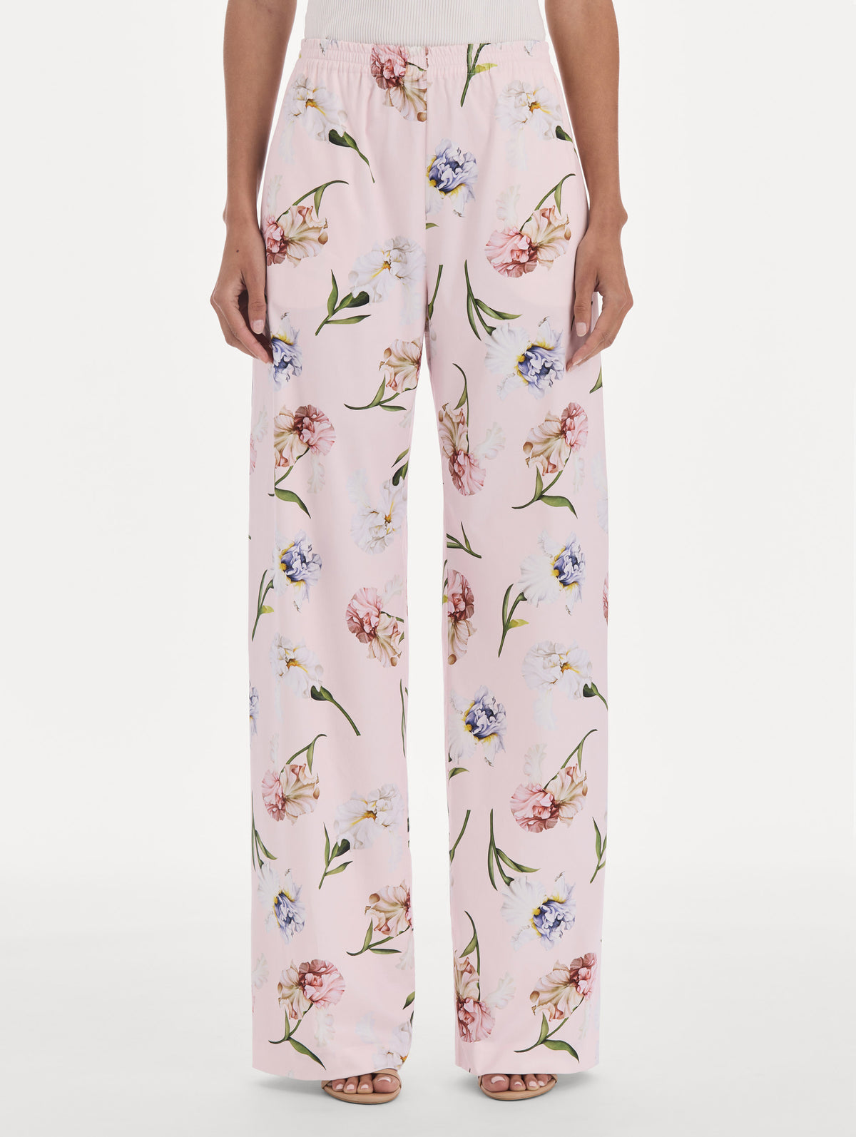 The model is wearing a painted iris poplin pant. Side view.