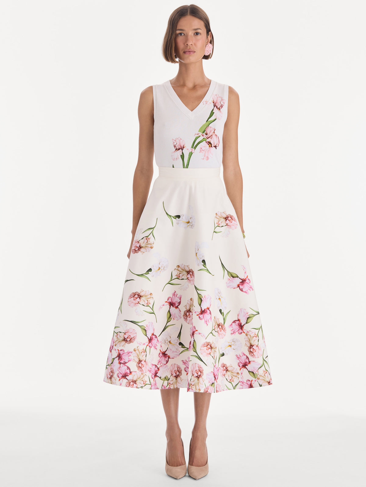 The model is wearing a painted iris degrade poplin A-line skirt. Front view.