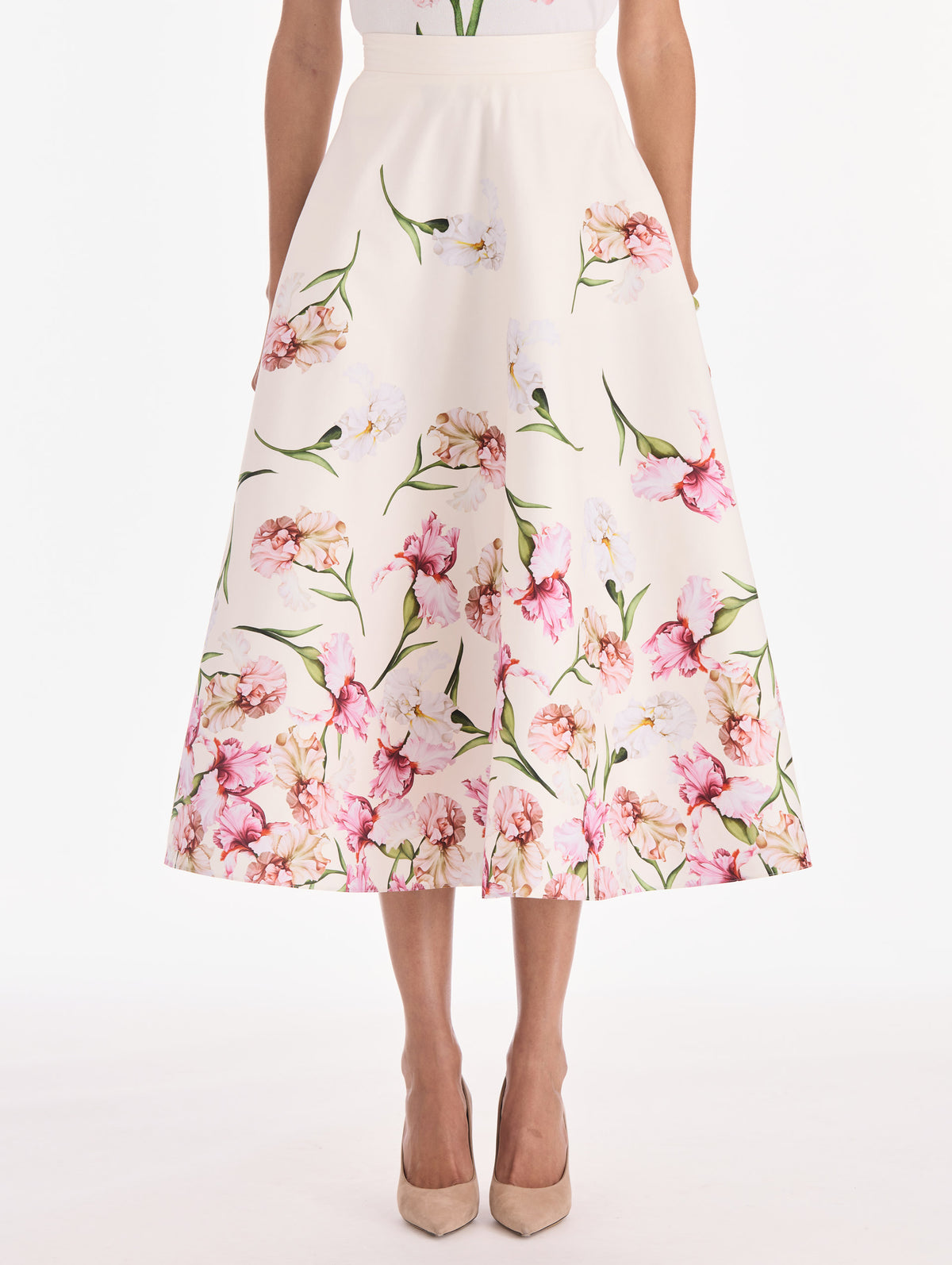 The model is wearing a painted iris degrade poplin A-line skirt. Side view.
