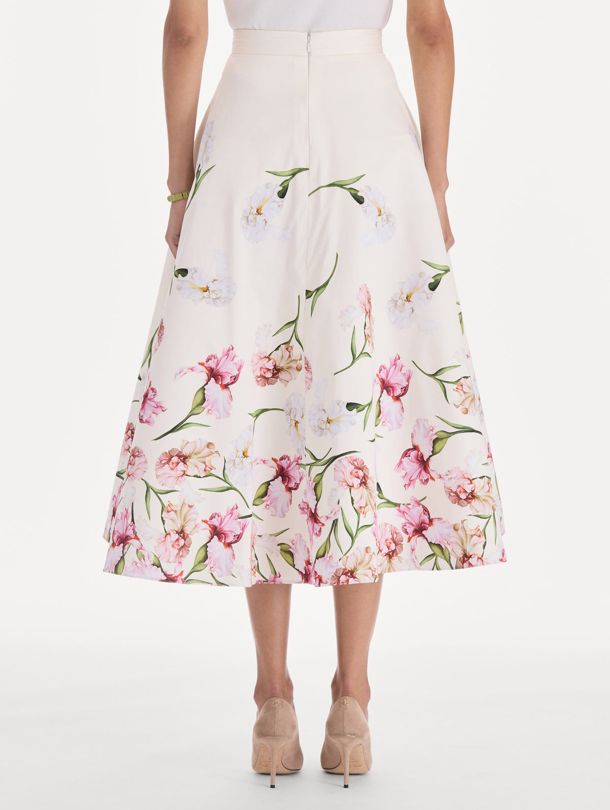 The model is wearing a painted iris degrade poplin A-line skirt. Back view.