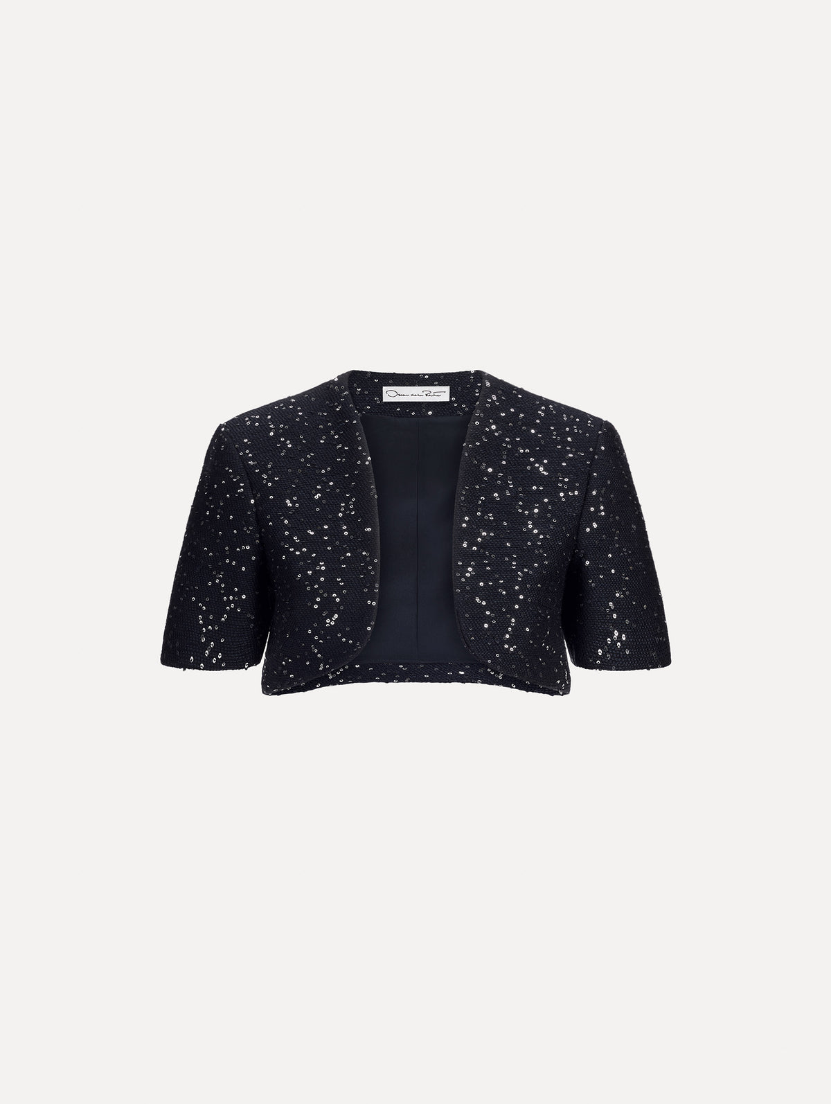 The image depicts a short sleeve sequin tweed cape. Front view.