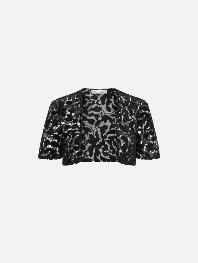 The image depicts a short sleeve cape. Front view.