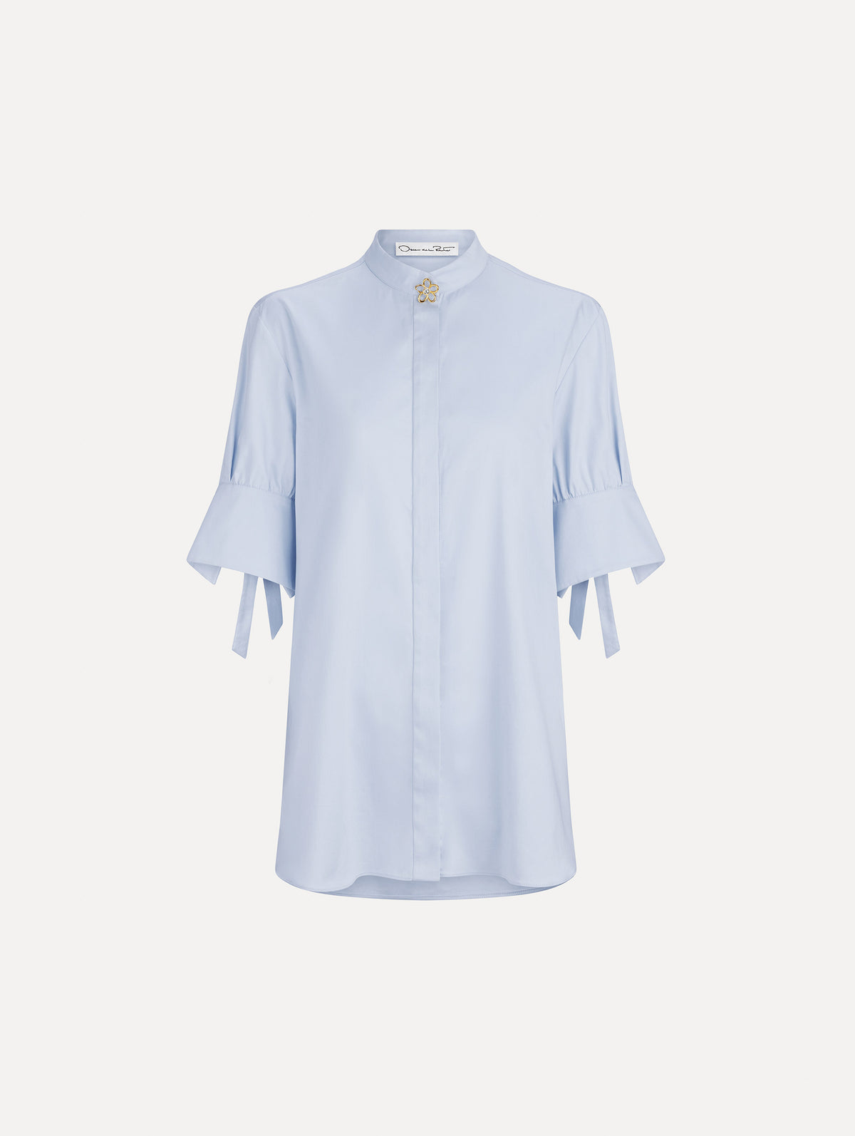 The image depicts a short sleeve cotton poplin sateen blouse. Front view.