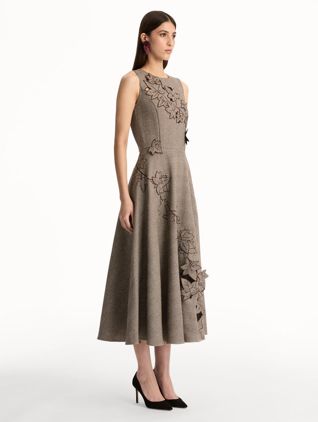 Brown and White Ivy Threadwork Cutout Dress with sleeveless silhouette and cutout floral applique. Side View.