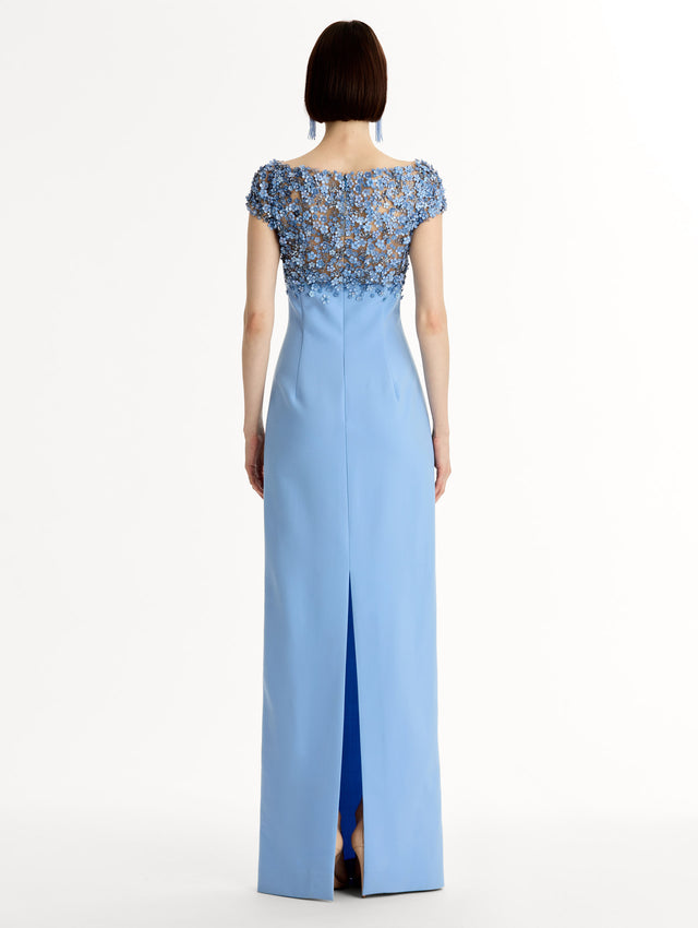 Blue floor length gown with Porcelain-flower motif on cap-sleeve bodice covered in sequins and crystals forming a delicate, petal-like lattice. Double-faced stretch wool skirt. Back View. 
