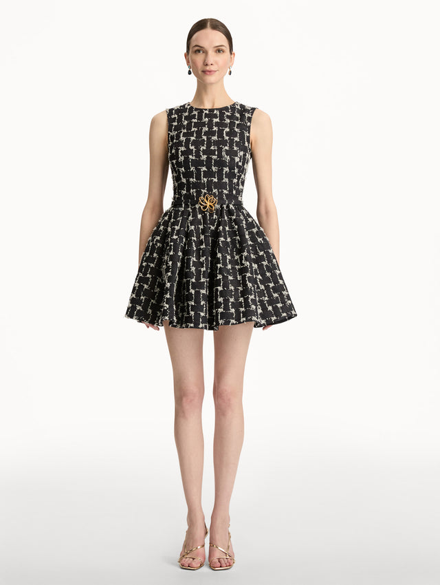 Black and Ivory Woven Denim Jacquard Mini Dress with a fitted waist, flared skirt, and gold floral belt detail. Front View.