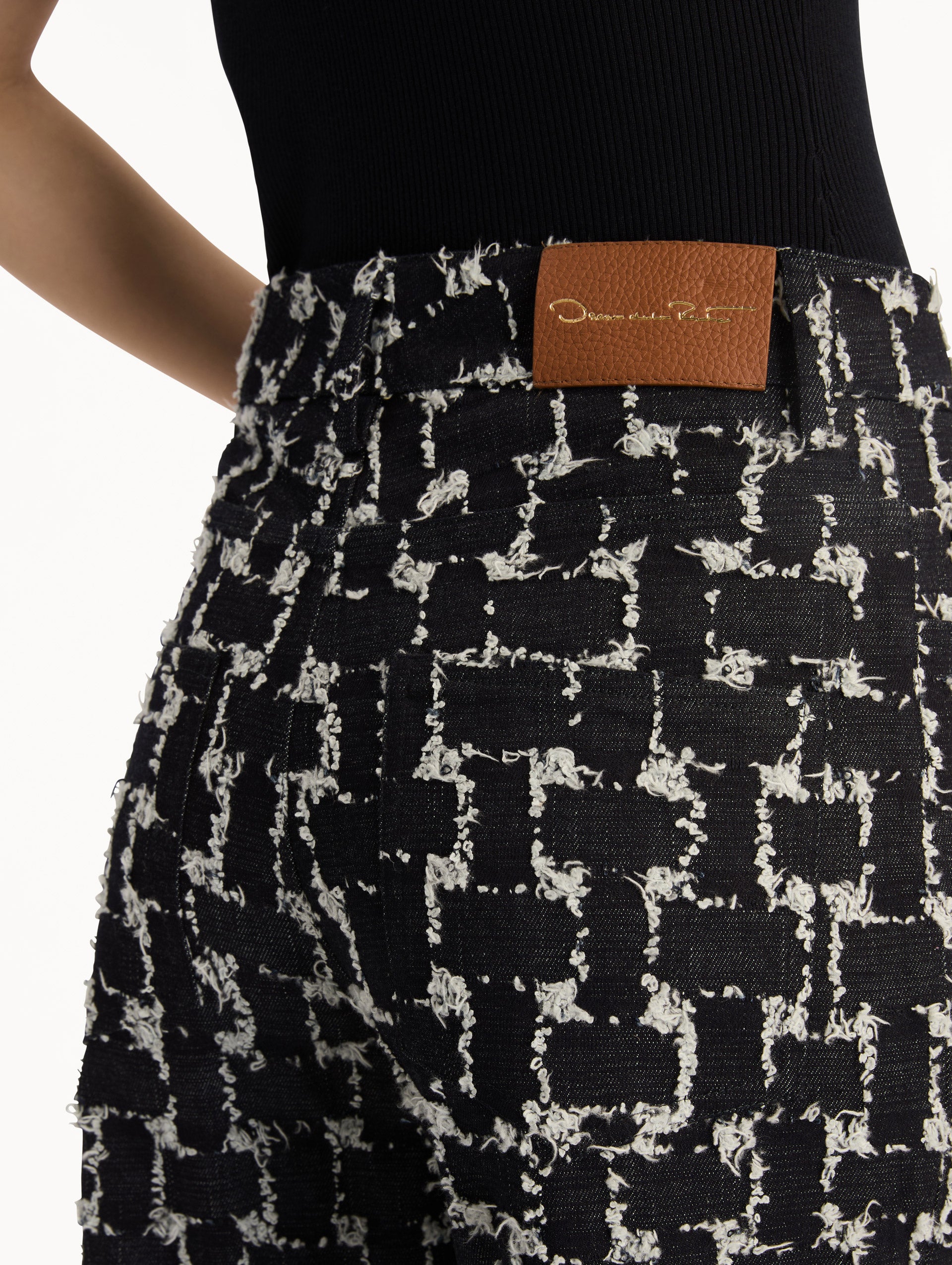 Black and White Woven Denim Jacquard Pant with feather detailing. Zoom View.