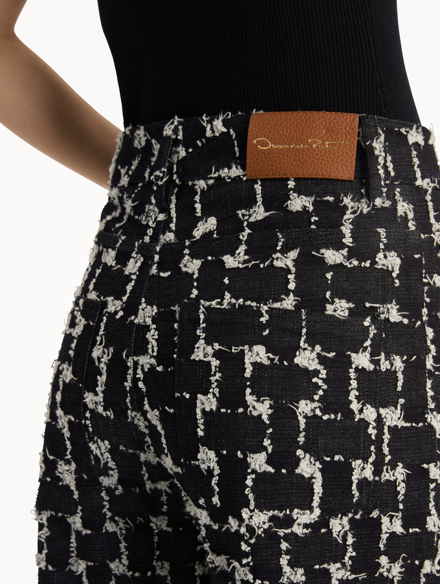 Black and White Woven Denim Jacquard Pant with feather detailing. Zoom View.