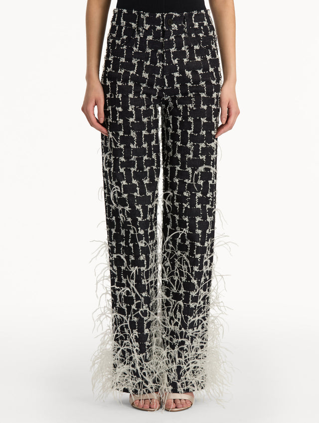 Black and White Woven Denim Jacquard Pant with feather detailing. Front View.