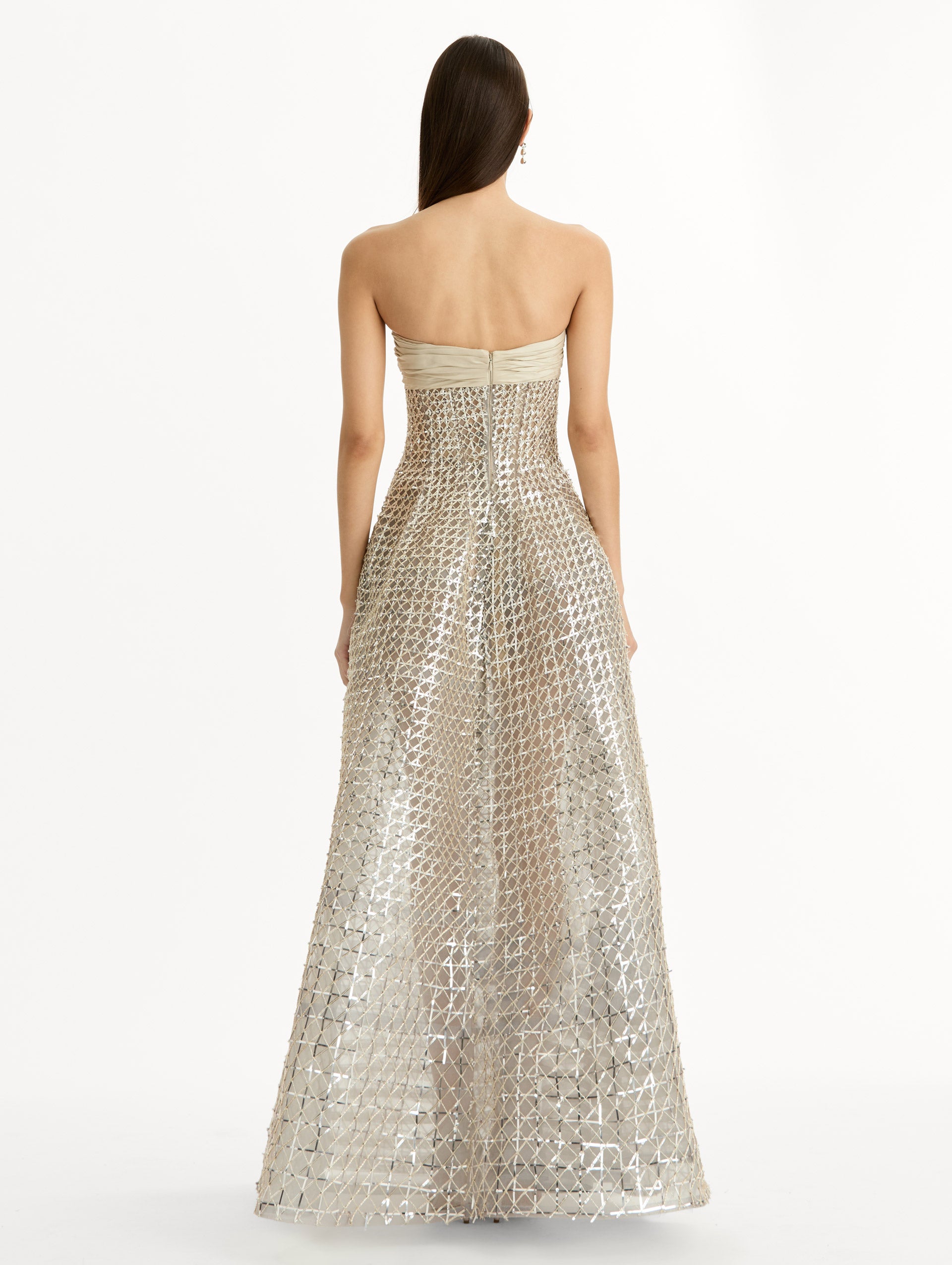 Floor length, silver, strapless Sequin & Bugle Bead Lattice Gown with Sheer Skirt. Back View.