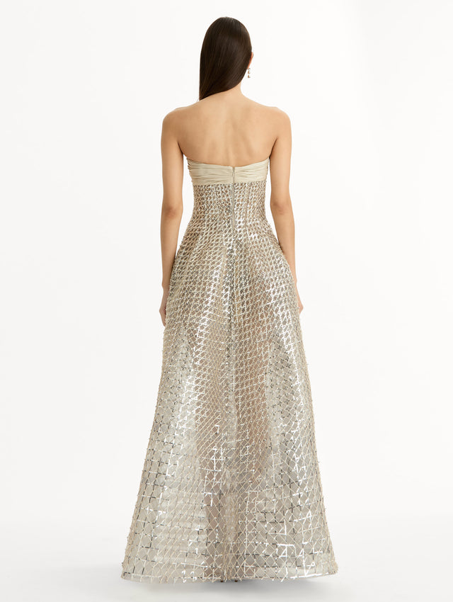Floor length, silver, strapless Sequin & Bugle Bead Lattice Gown with Sheer Skirt. Back View.
