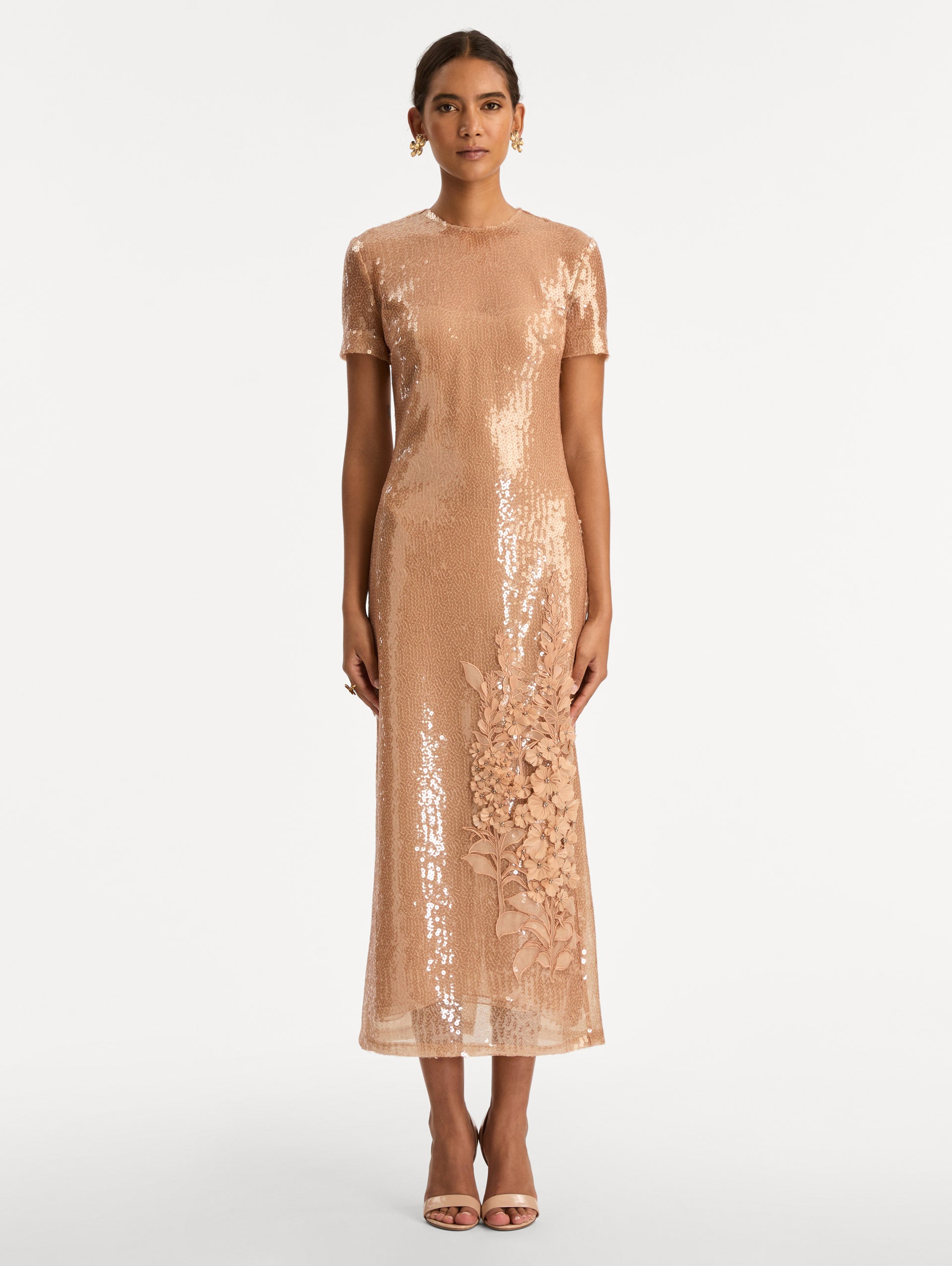 Rose Gold Foxglove Embroidered Sequin Tulle Dress with short sleeves and tonal floral appliqué detail near the hem. Front View.