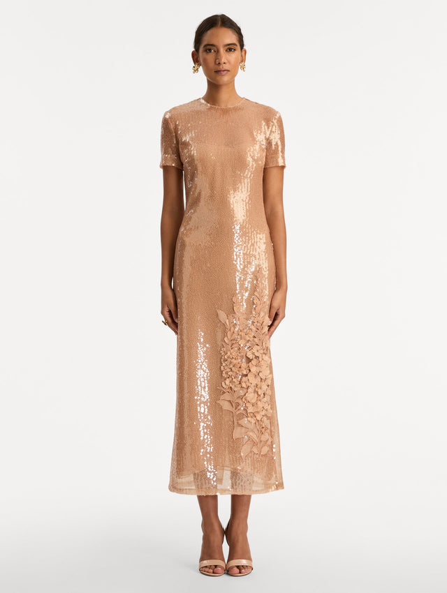 Rose Gold Foxglove Embroidered Sequin Tulle Dress with short sleeves and tonal floral appliqué detail near the hem. Front View.