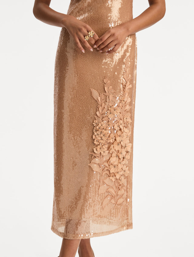 Rose Gold Foxglove Embroidered Sequin Tulle Dress with short sleeves and tonal floral appliqué detail near the hem. Zoom View.