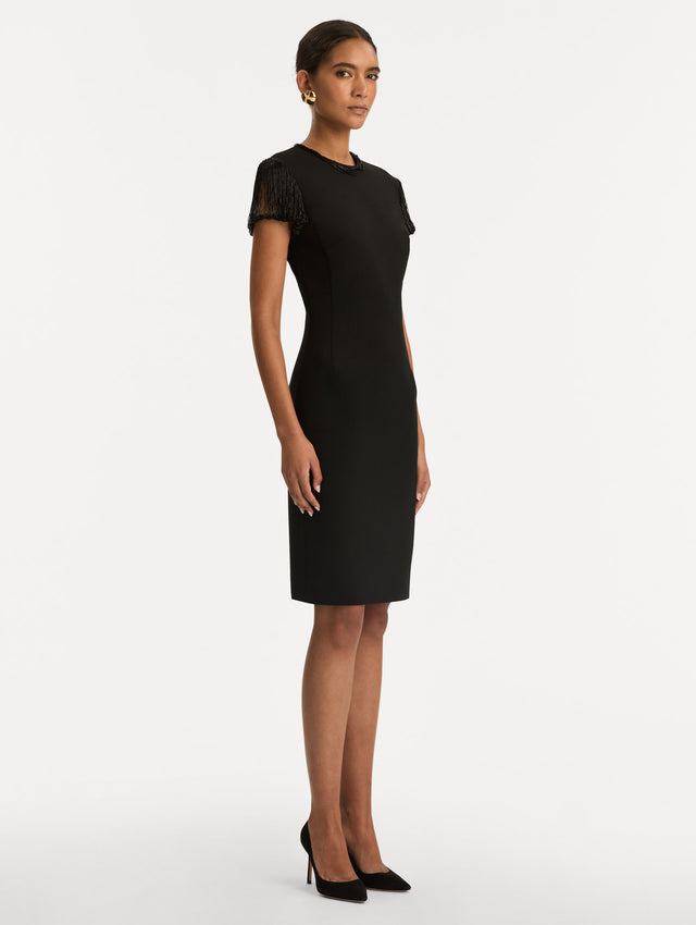 Black Bugle Bead Embroidered Cocktail Dress with beaded sleeves and a slim silhouette. Side View. 