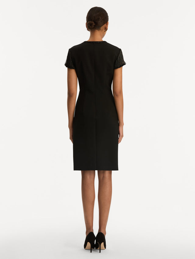 Black Bugle Bead Embroidered Cocktail Dress with beaded sleeves and a slim silhouette. Back View. 