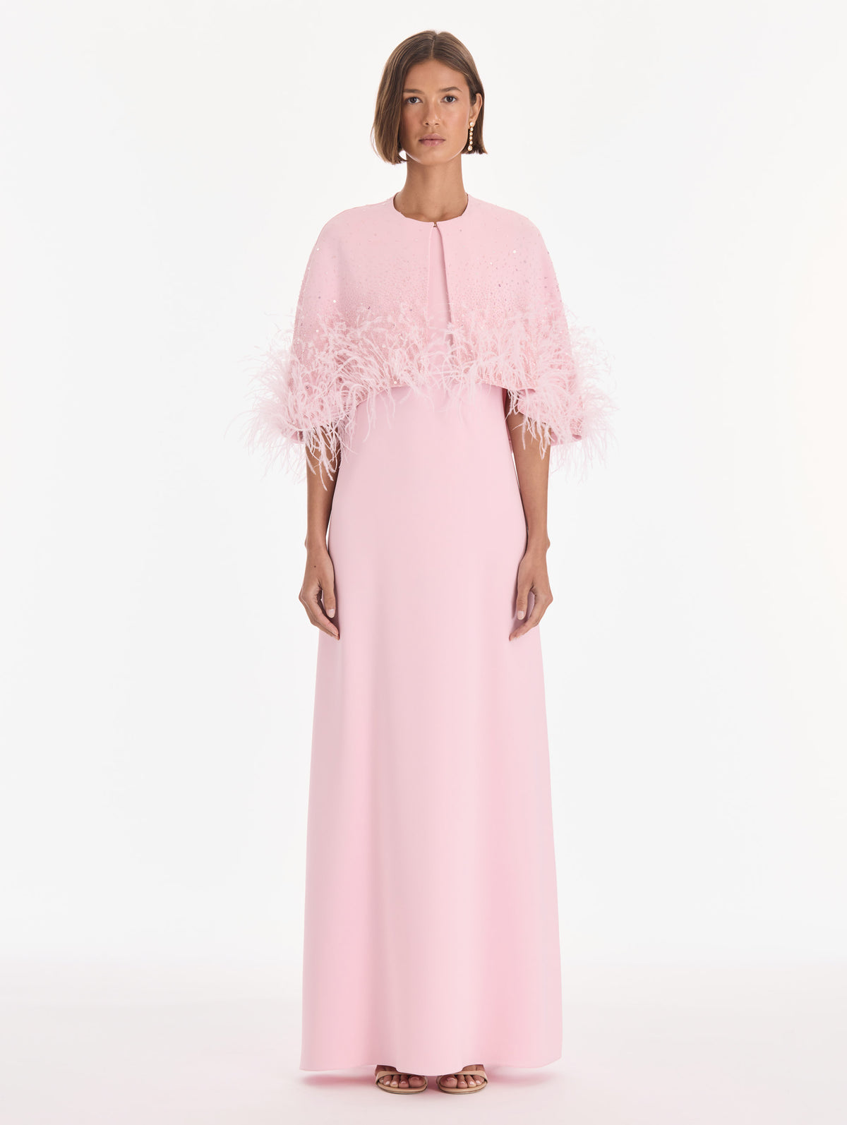 The model is wearing a cape mixed beaded embroidered caftan. Back view.
