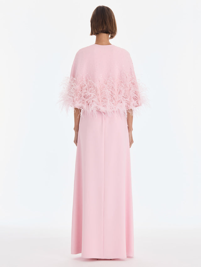 The model is wearing a cape mixed beaded embroidered caftan. Side view.