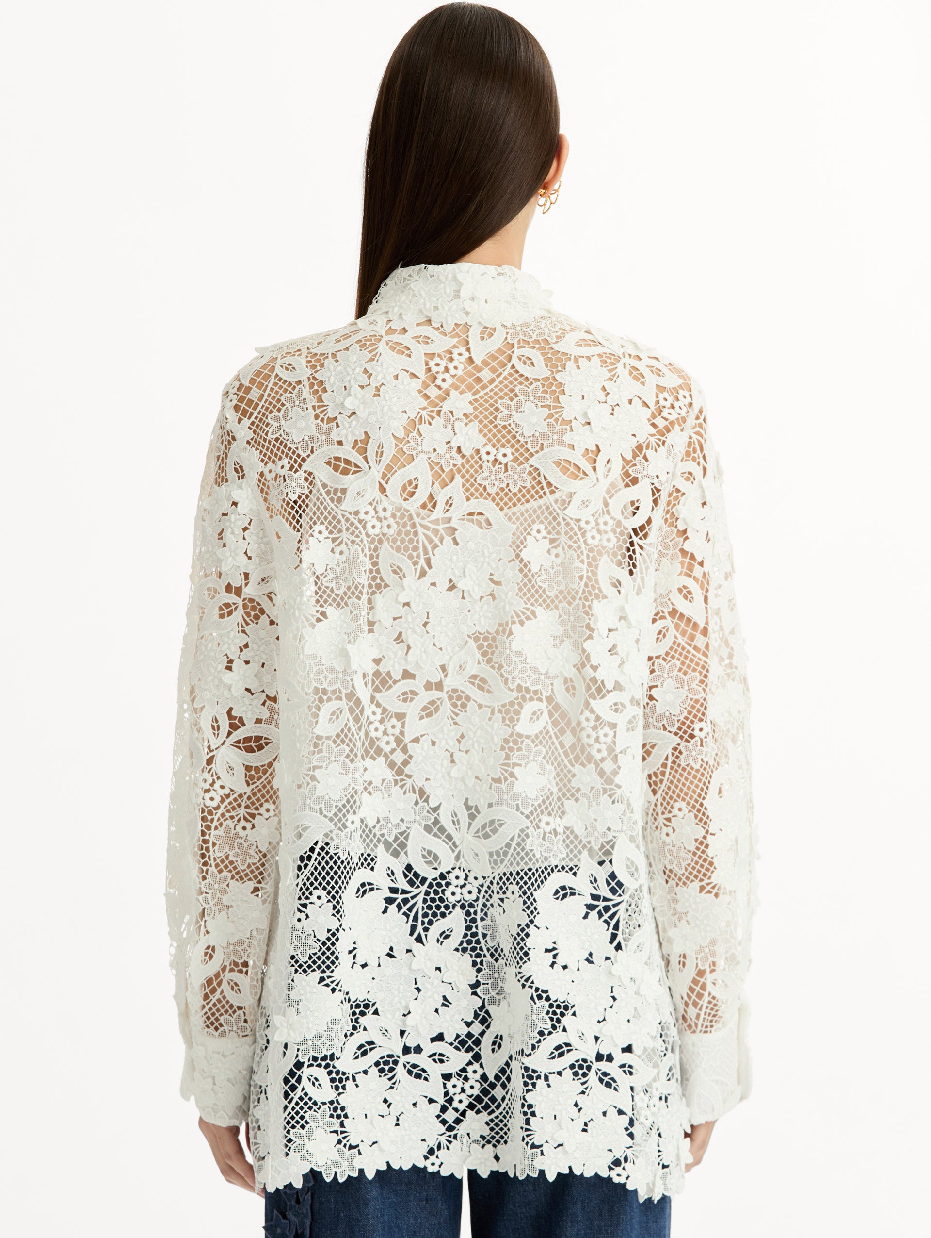 Long Sleeve, Button Up Blouse with Delicate guipure lace and intricate porcelain flower embroidery. White with pink florals. Back View.