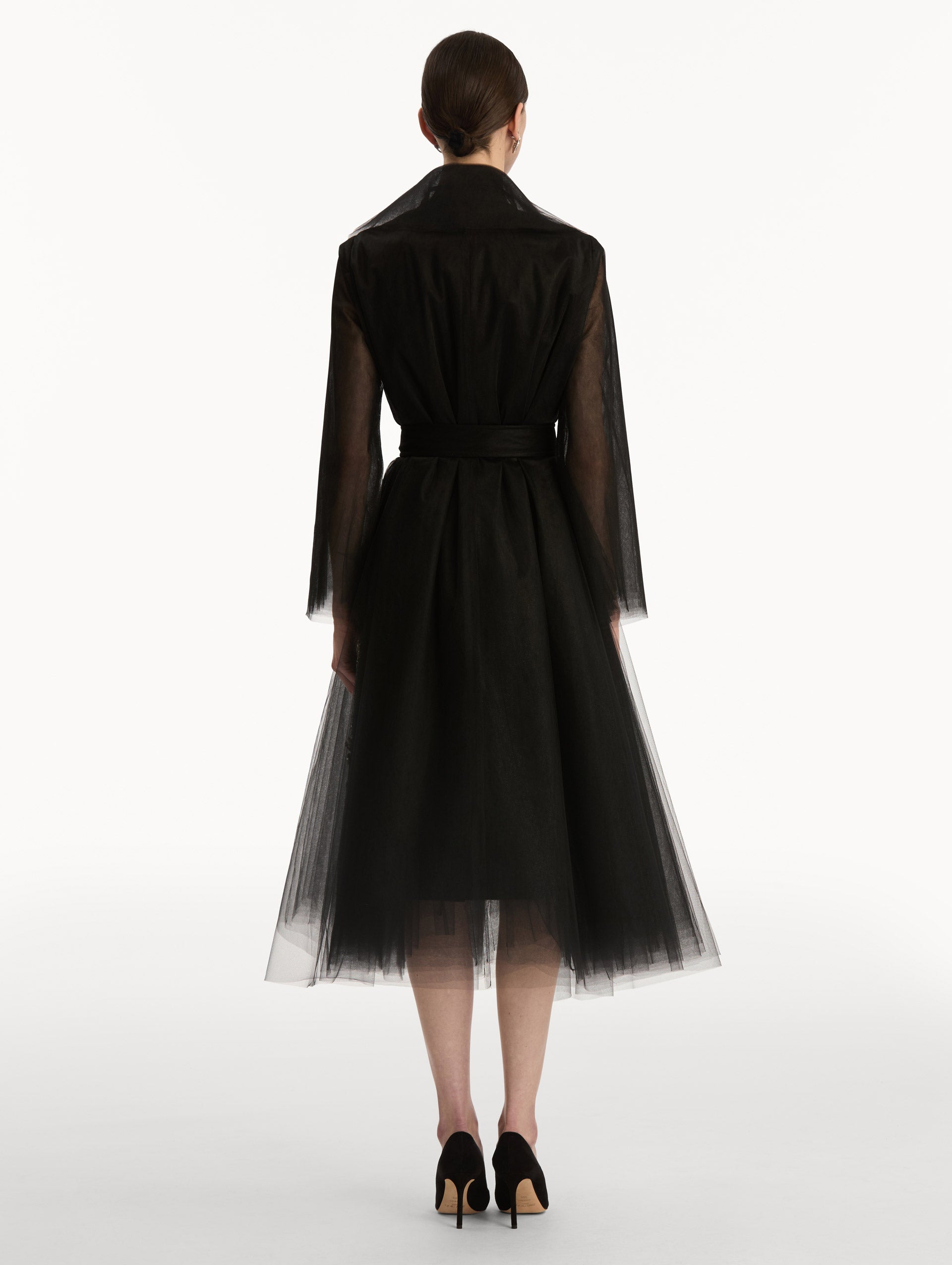 Black Foxglove Sequin Embroidered Opera Coat featuring a belted waist, wide collar, and embroidered floral detailing over a midi-length silhouette. Back View.