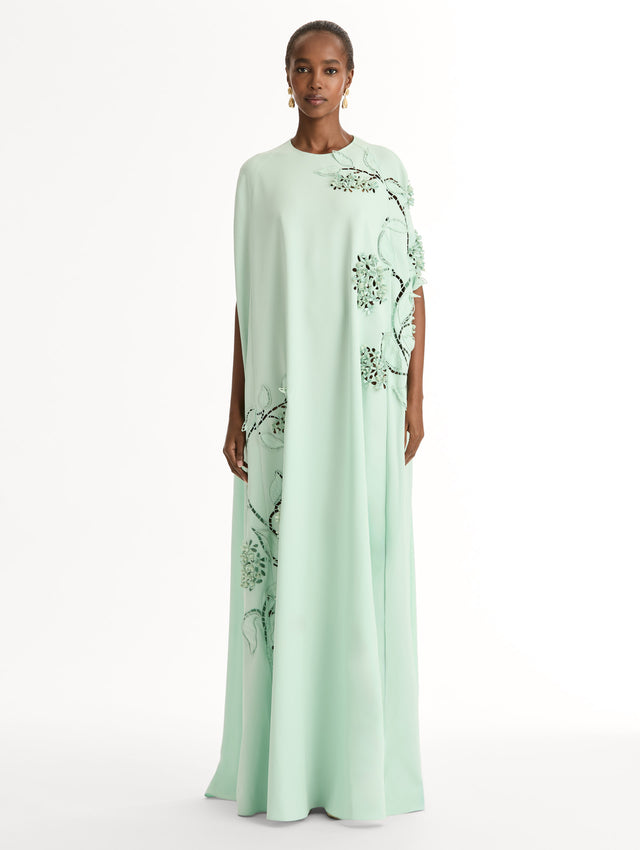 Mint caftan in heavy silk stretch georgette. Porcelain-flower threadwork cutouts.  Dimensional petals and delicately openwork stems. Front View. 