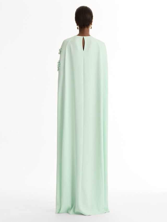 Mint caftan in heavy silk stretch georgette. Porcelain-flower threadwork cutouts.  Dimensional petals and delicately openwork stems. Back View. 