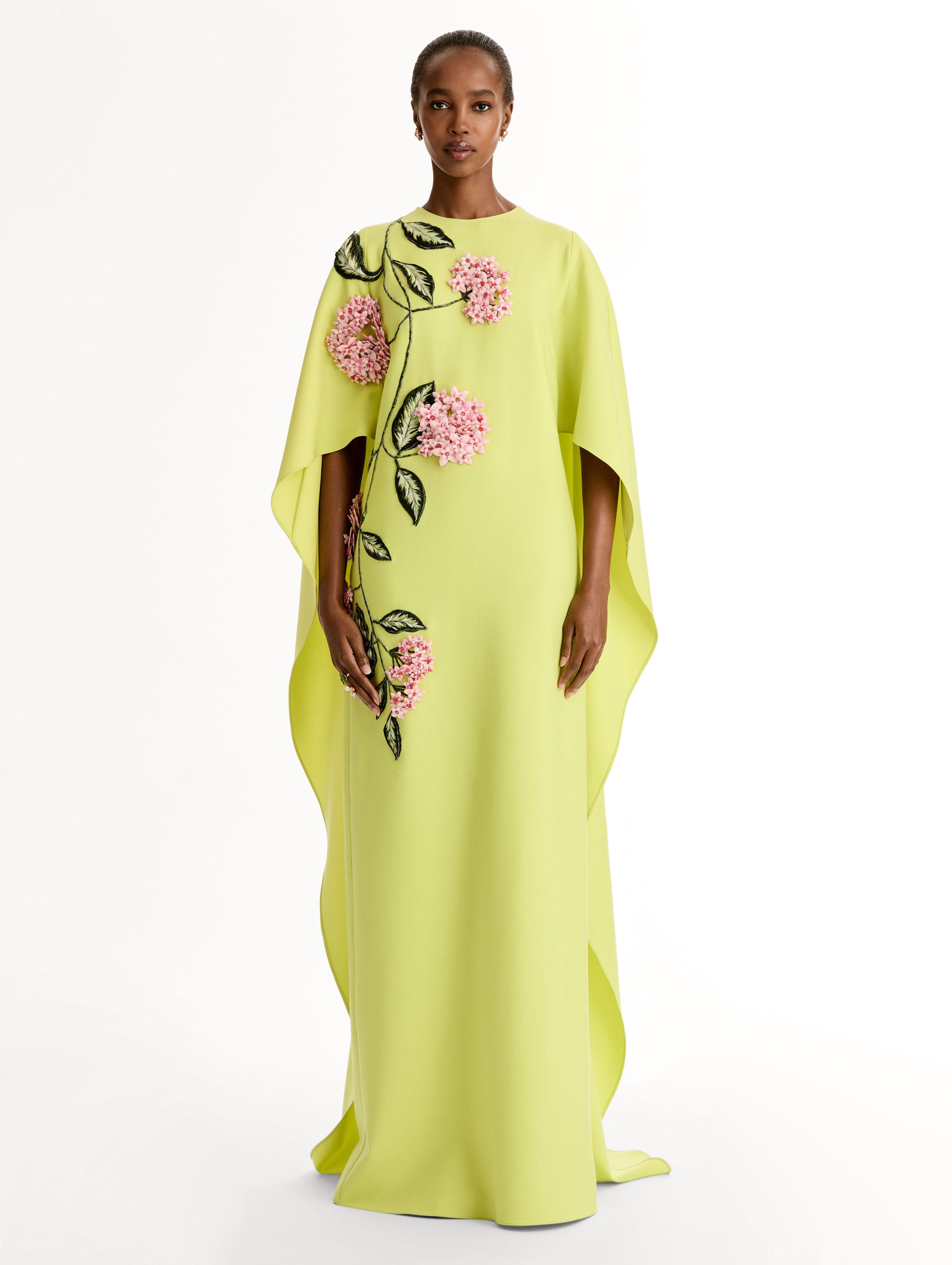  Caftan in double-faced stretch wool, with porcelain-flower threadwork and three-dimensional blossoms. Front View. 