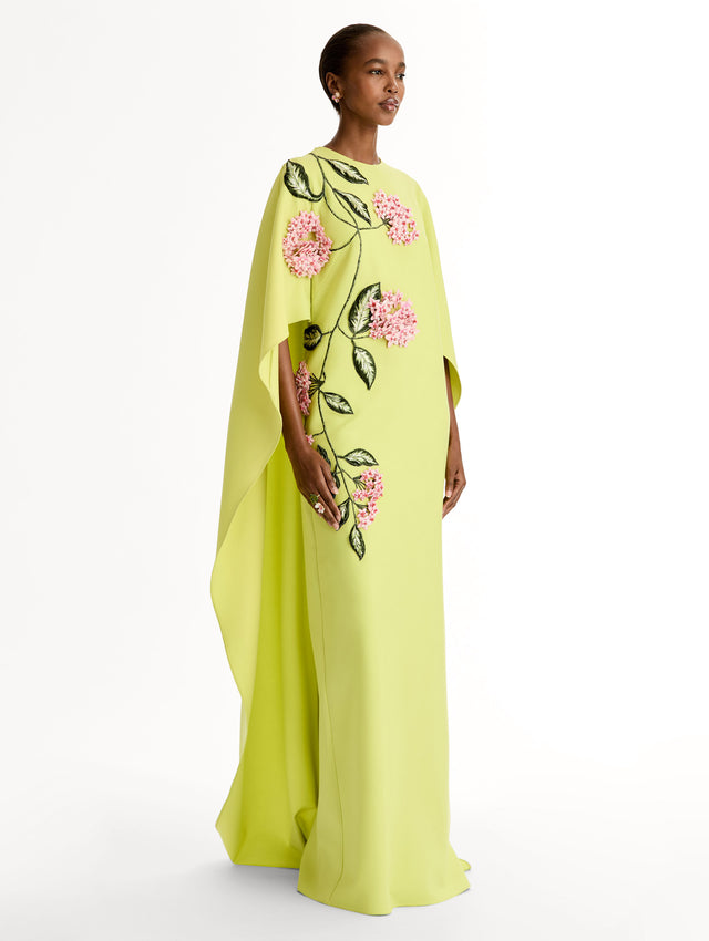  Caftan in double-faced stretch wool, with porcelain-flower threadwork and three-dimensional blossoms. Side View. 