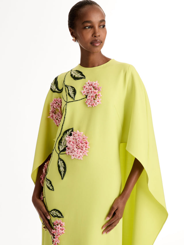  Caftan in double-faced stretch wool, with porcelain-flower threadwork and three-dimensional blossoms. Front View, Close Up. 