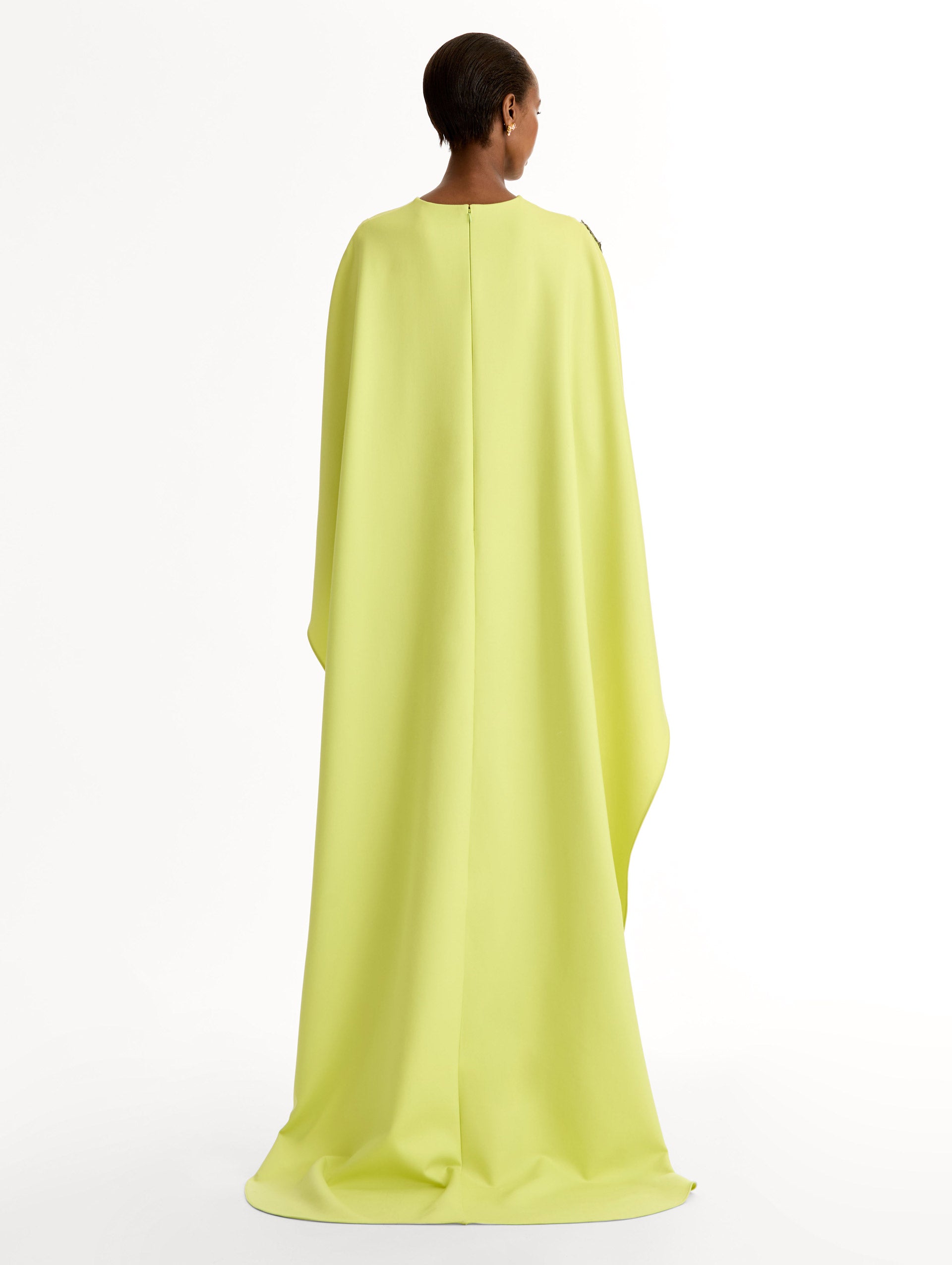  Caftan in double-faced stretch wool, with porcelain-flower threadwork and three-dimensional blossoms. Back View. 